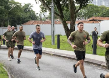 Pete Hegseth running with soldiers.