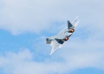 A Su-57 fighter in flight.