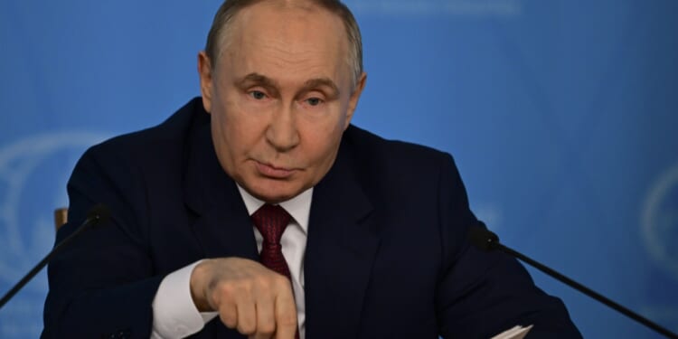 Russian president Vladimir Putin makes statements to the press.