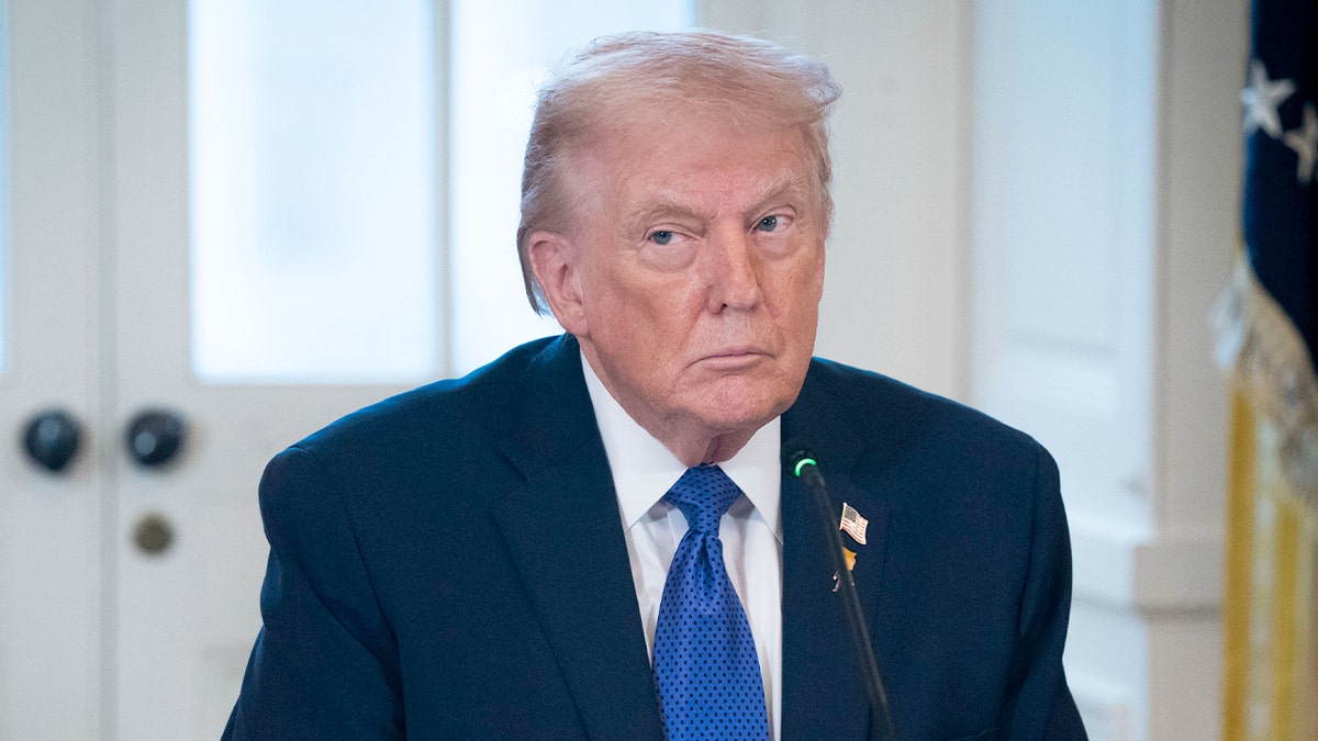 Donald Trump addresses a group at the White House.