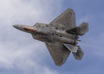 An F-22 Raptor flies overhead during an aerial demonstration at Marine Corps Air Station Kaneohe Bay, Hawaii, Aug. 9, 2025.