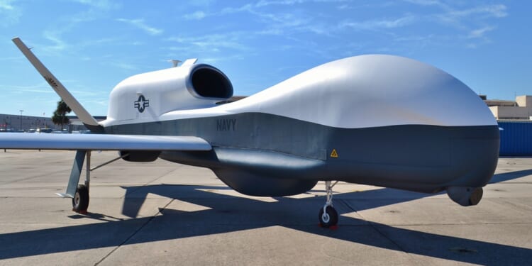An MQ-4C Triton drone on the tarmac.