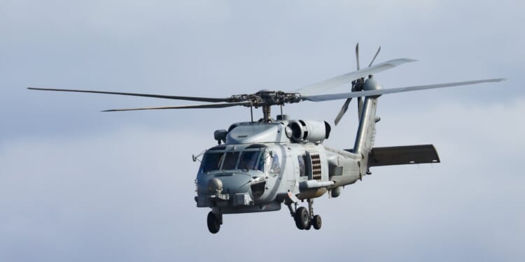 An MH-60R "Romeo" Seahawk helicopter in flight.