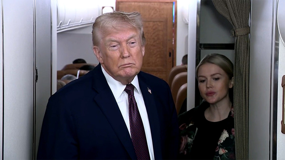 Trump speaks on Air Force One.