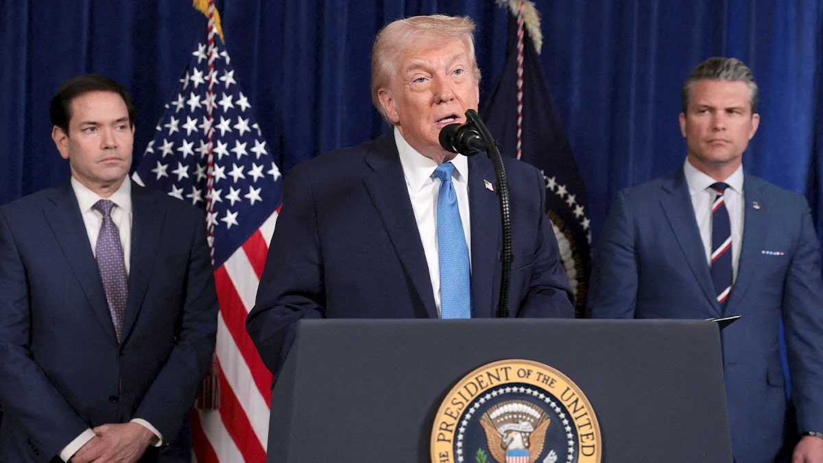 Trump speaks while flanked by Rubio and Hegseth