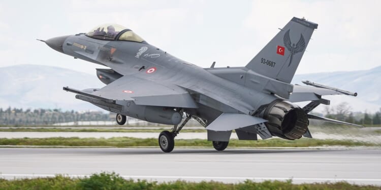 A Turkish F-16 fighter taking off.