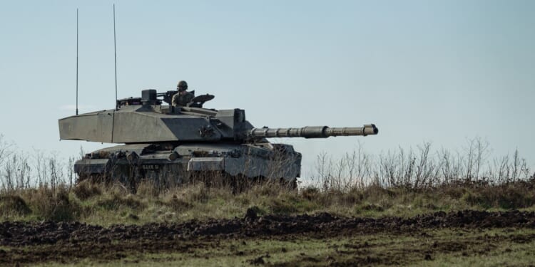 A British Challenger tank aiming its gun.