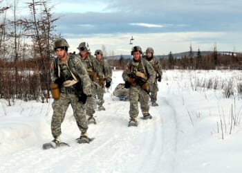 A group of US Army soldiers in winter.