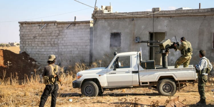 Truck and machine gun from the Syrian Civil War.