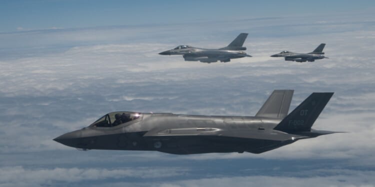 F-35 flying above the clouds.