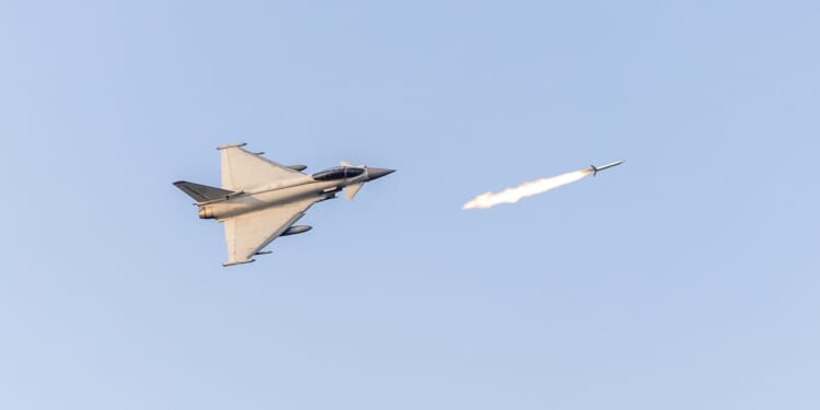 An aircraft launching a missile.