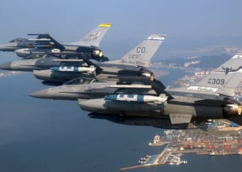 A group of Air National Guard fighter jets flying over South Korea.