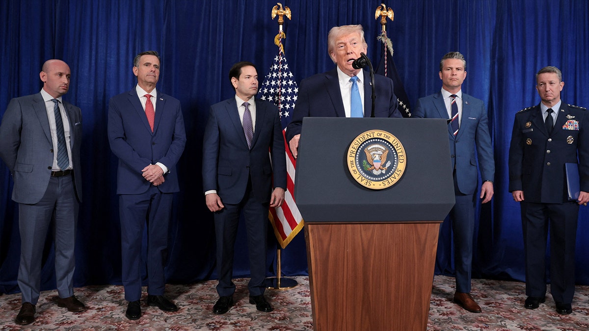 U.S. President Donald Trump speaks as White House Deputy Chief of Staff Stephen Miller, CIA Director John Ratcliffe, Secretary of State Marco Rubio, Secretary of Defense Pete Hegseth and General Dan Caine, Chairman of the Joint Chiefs of Staff, look on during a press conference following a U.S. strike on Venezuela where President Nicolas Maduro and his wife, Cilia Flores, were captured, from Trump's Mar-a-Lago club in Palm Beach, Florida, U.S., January 3, 2026.