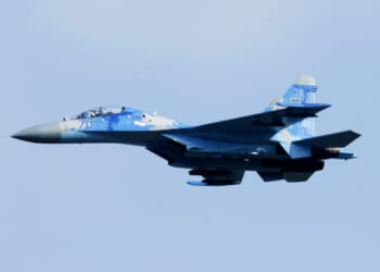 A Ukrainian Sukhoi Su-27 Flanker flies over the flightline during the opening ceremony of exercise Clear Sky 18 at Starokostiantyniv Air Base, Ukraine, Oct. 8, 2018.