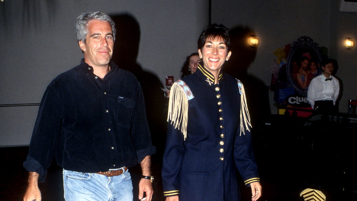 Jeffrey Epstein and Ghislaine Maxwell smiling.