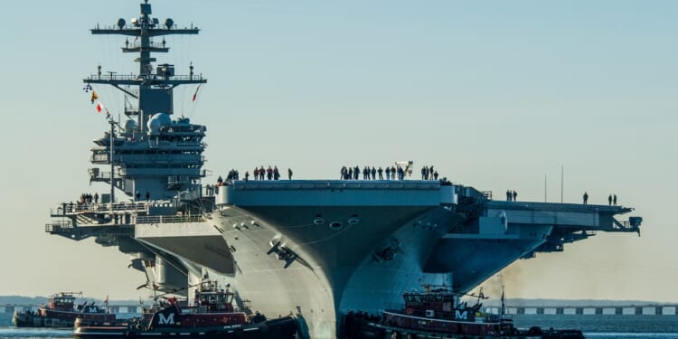 The USS George H.W. Bush aircraft carrier at sea.