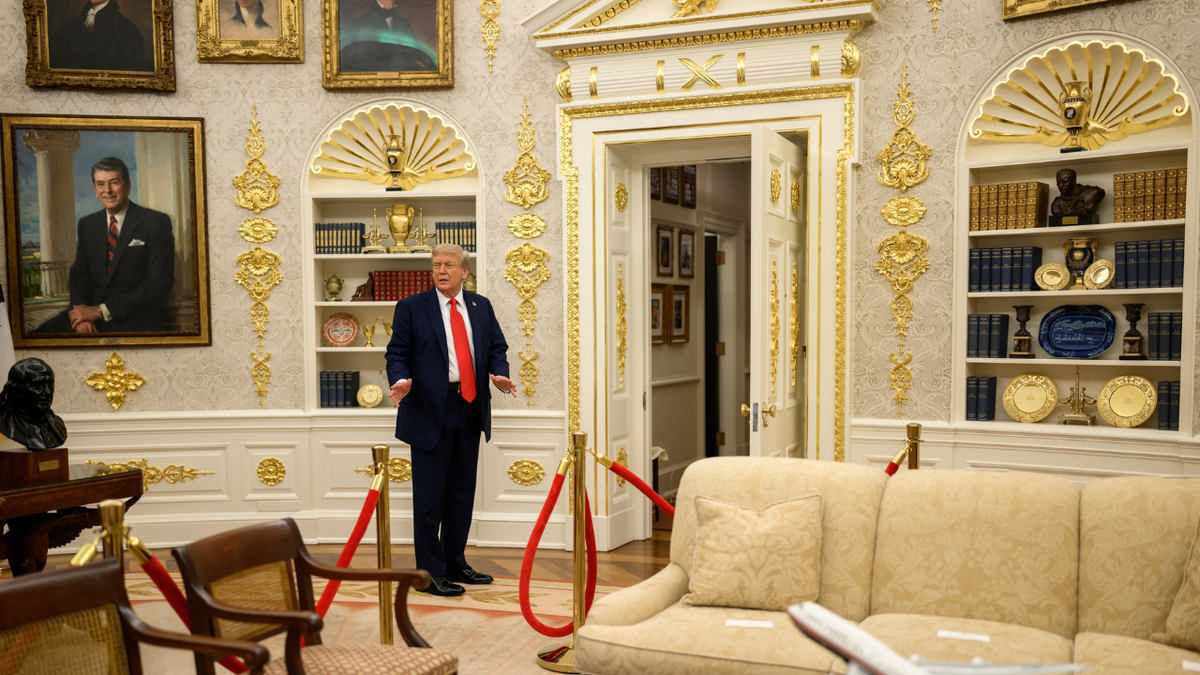 Trump speaks to reporters in the Oval Office