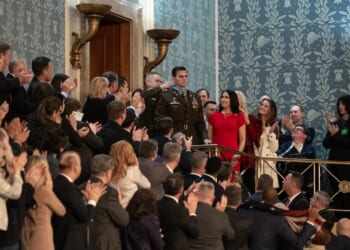 Eric Slover, a helicopter pilot, is given the Medal of Honor during Donald Trump's State of the Union address.