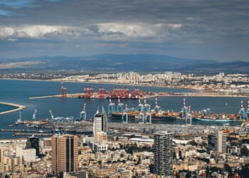 An overhead view of the Israeli port city of Haifa, including its docks.