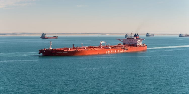 Suez, Egypt - November 5, 2017: Crude Oil Tanker Aegean Angel vessel passing the New Suez Canal (The Great Bitter Lake) near Suez, Egypt, Africa.