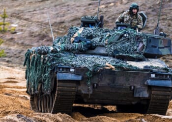 A CV90 infantry fighting vehicle during military exercises.