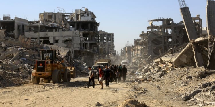 Gaza ruins undergoing reconstruction.