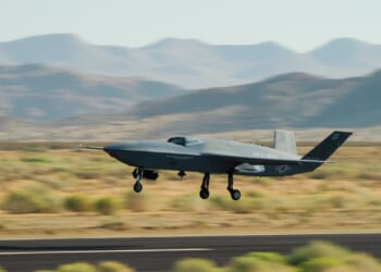 A YFQ-42A drone takes off from a runway.