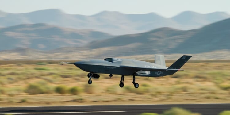 A YFQ-42A drone takes off from a runway.