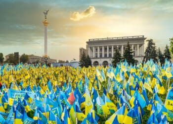Independence Square in Kyiv, Ukraine, with Ukrainian flags memorializing fallen soldiers.
