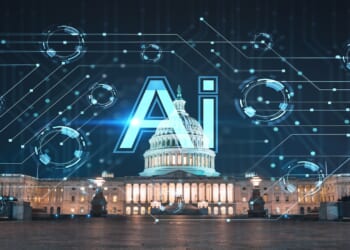 The US Capitol at night overlaid with a glowing AI symbol.