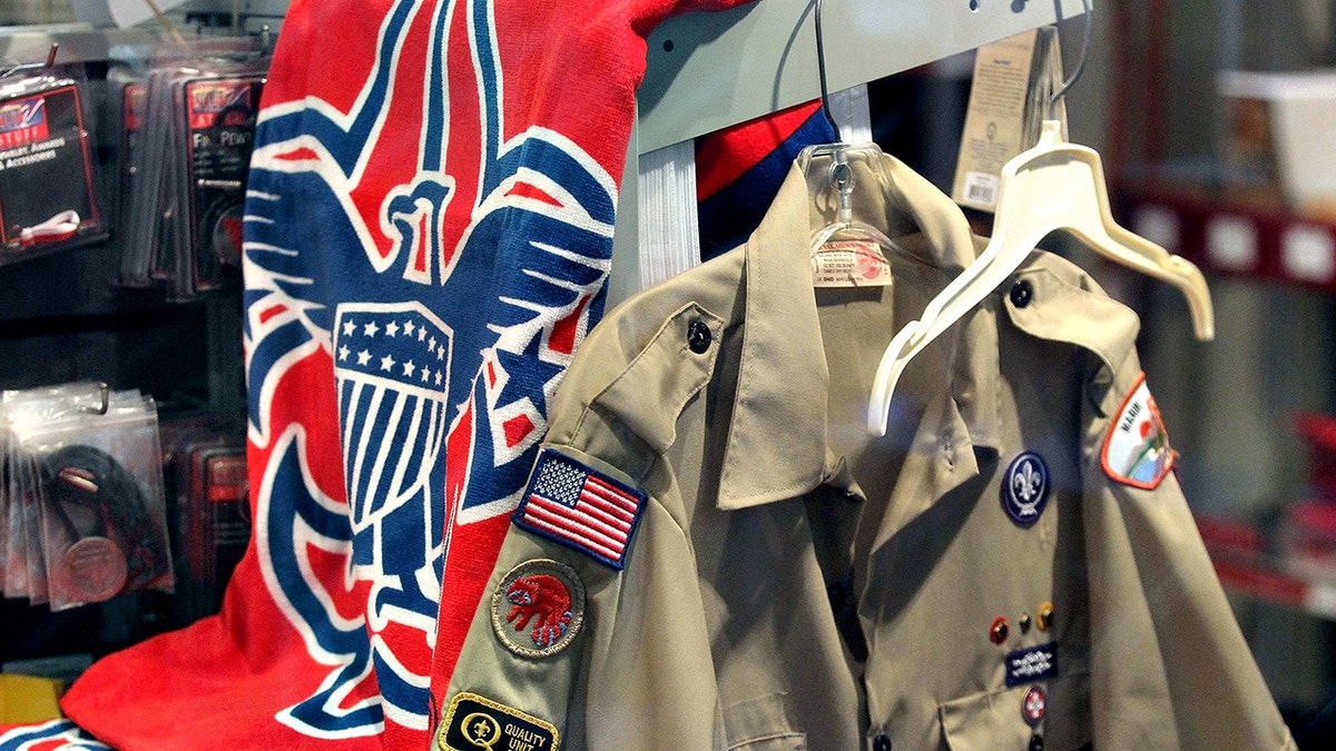 Boy Scout logo and a uniform