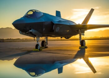 An F-35 fighter jet on display on the tarmac.