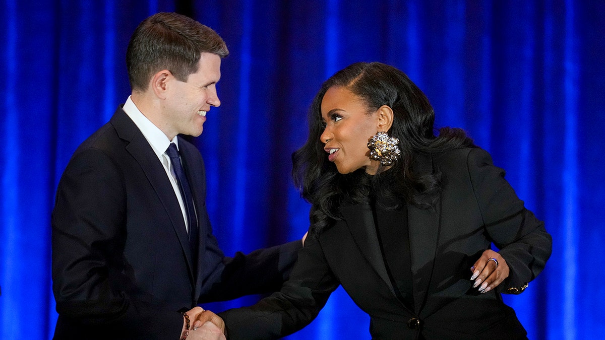 Talarico shakes hands with Crockett