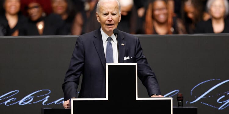 Biden tells mourners he's 'smarter than most' at Jackson memorial