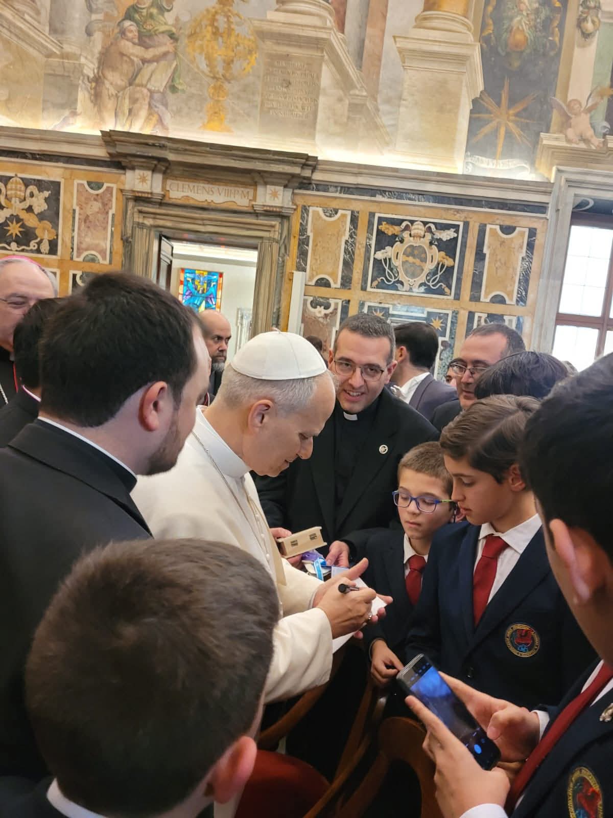 Pope Leo XIV shows his affection for Fernando Bejarano Calvo and the other children during an audience at the Vatican. | Credit: Photo courtesy of the Bejarano Calvo family