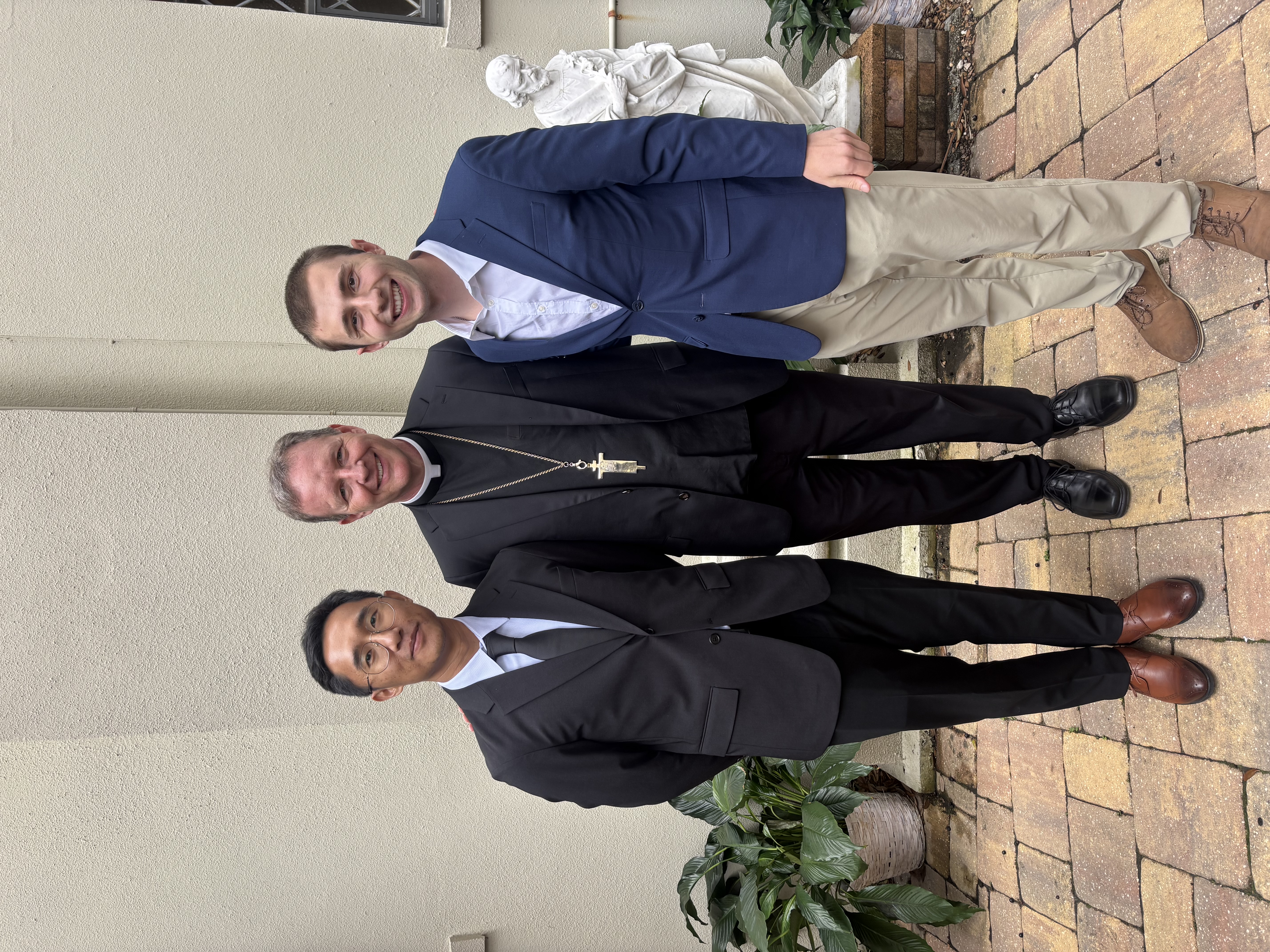 Tzu Ping Liu (Davis) and Robert Manoogian with Bishop Erik T. Pohlmeier of the Diocese of St. Augustine, Florida, after the Rite of Election, which took place on Feb. 28, 2026, at the Cathedral Basilica of St. Augustine. | Credit: Photo courtesy of Robert Manoogian