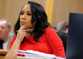 Judge bars Fani Willis from Trump legal fee fight after disqualification