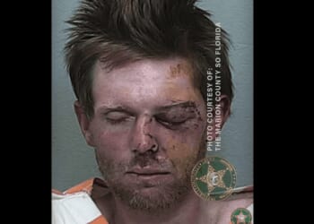 Axe-wielding thug allegedly threatens Florida car-wash employees — then 1 victim violently turns the tables on him