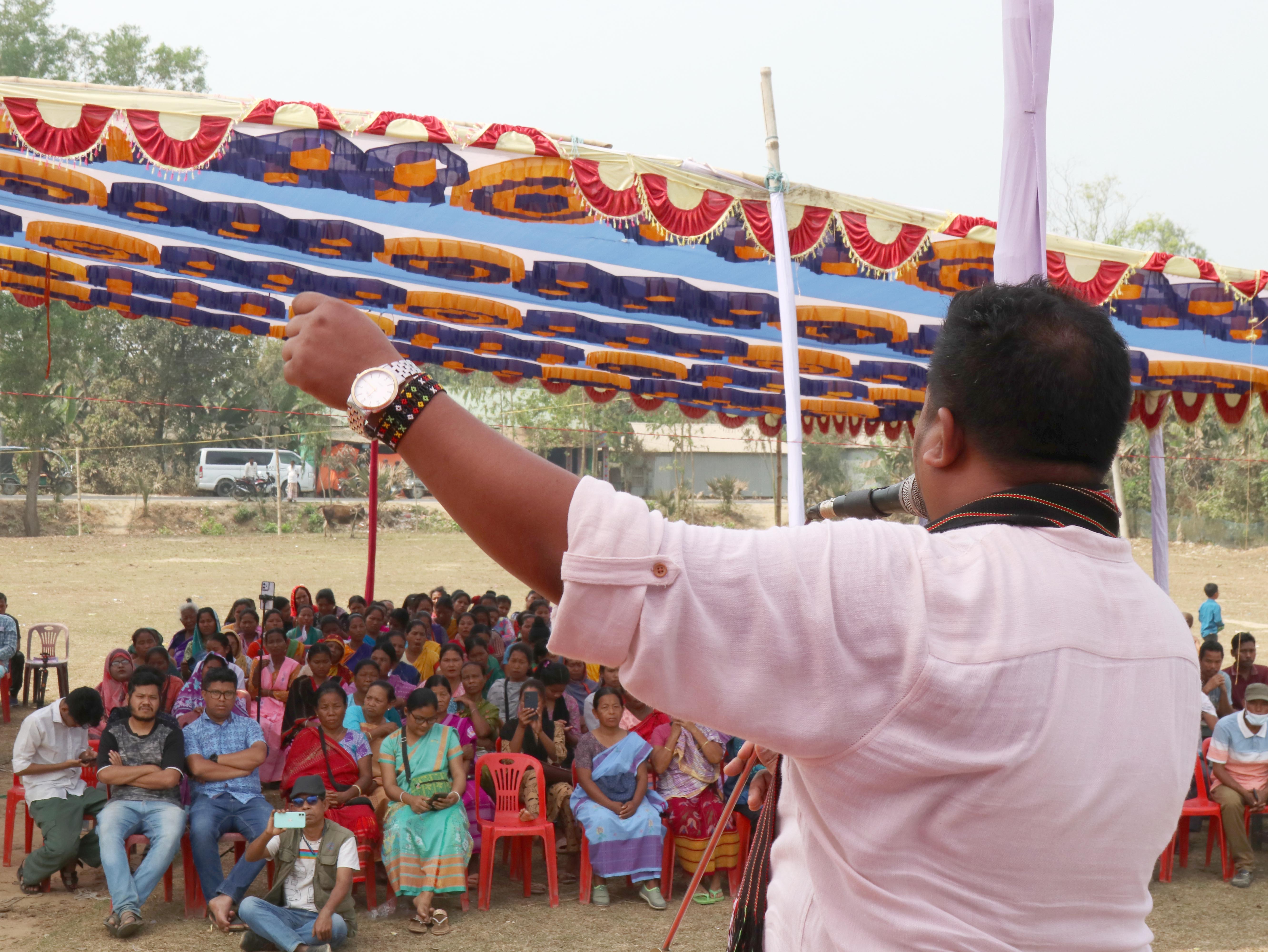 A speaker addresses Indigenous Garo people at a protest rally in Madhupur, Bangladesh, on March 6, 2026. | Credit: Stephan Uttom Rozario