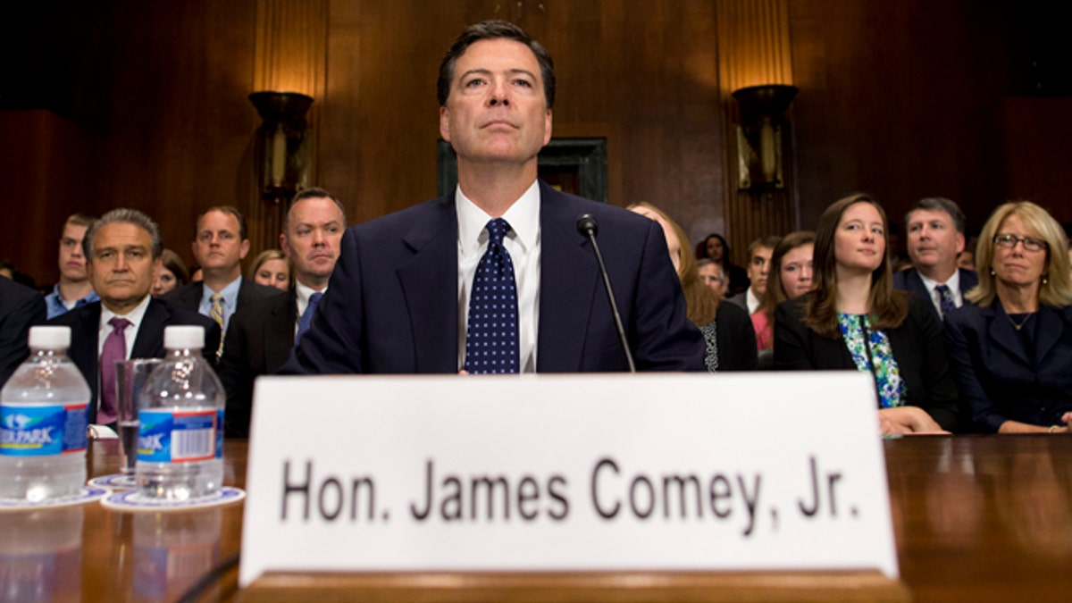 FILE: July 9, 2013: FBI Director James Comey during a Senate confirmation hearing, in Washington, D.C. 