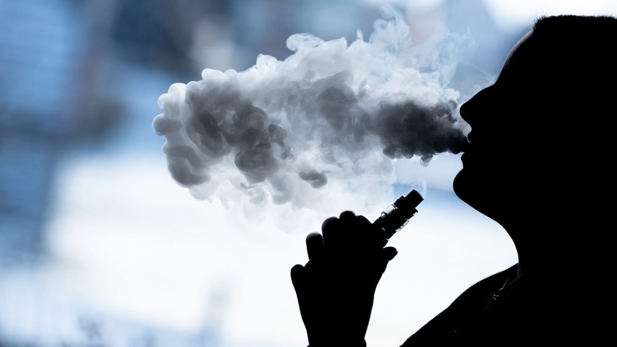 woman smoking ecigarette