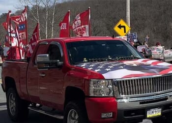 Trump Supporter in Big Red Truck Trolls Leftist 'No Kings' Protesters