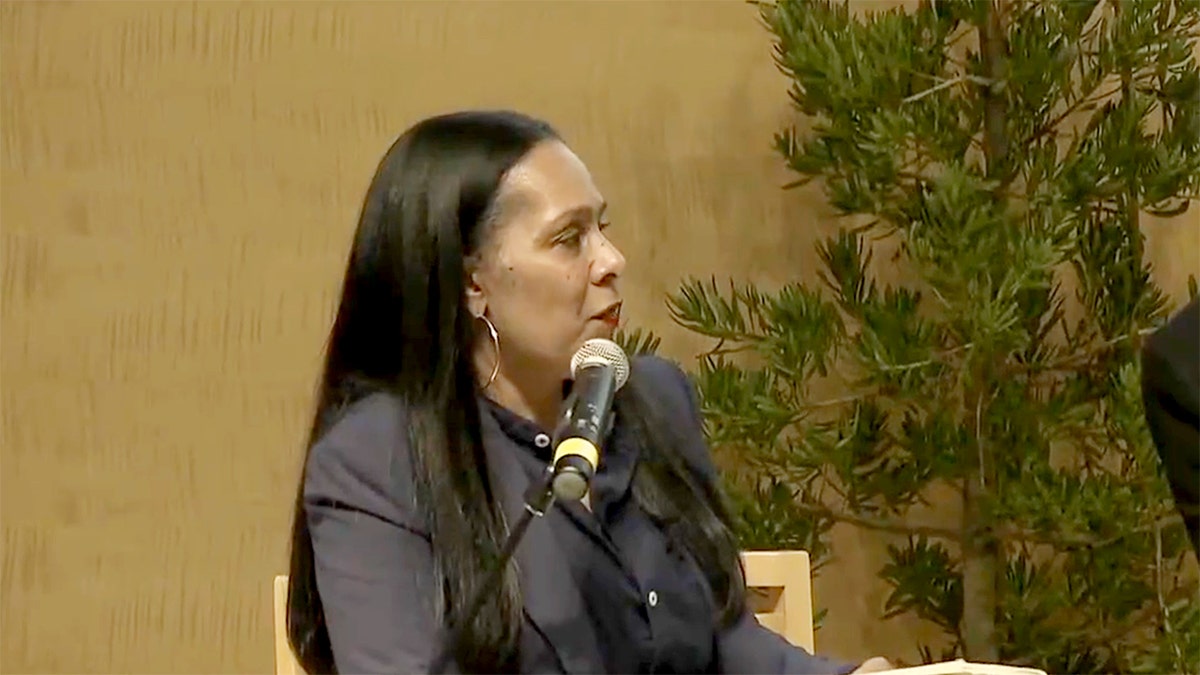 Sheryl Davis at microphone