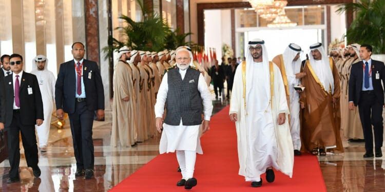 UAE President Mohamed bin Zayed (MBZ) and Indian Prime Minister Narendra Modi walking together.