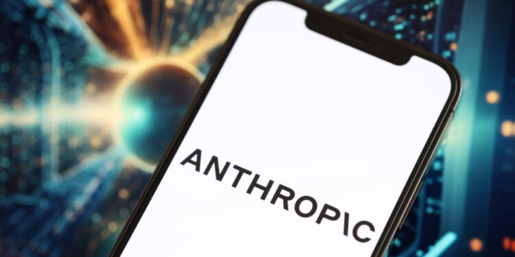 A smartphone displaying the Anthropic logo.