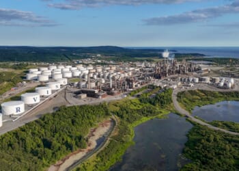 Bishops of global south urge abandonment of fossil fuels; some Catholic economists warn against it