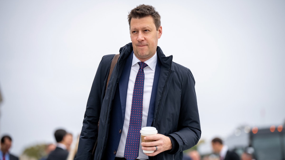 Congressman Josh Riley walks toward the U.S. Capitol.