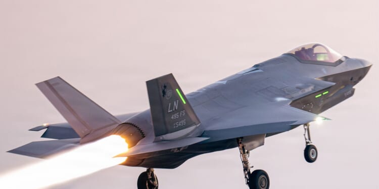 An F-35 taking off from an aircraft carrier.