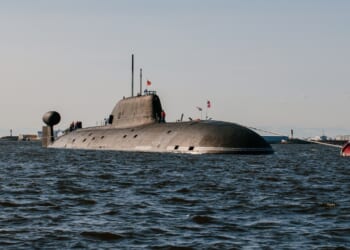 A Russian submarine at sea in poor weather.