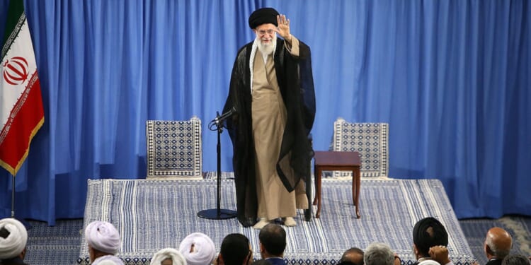Iranian Supreme Leader Ali Khamenei speaking with Iranian clerics.